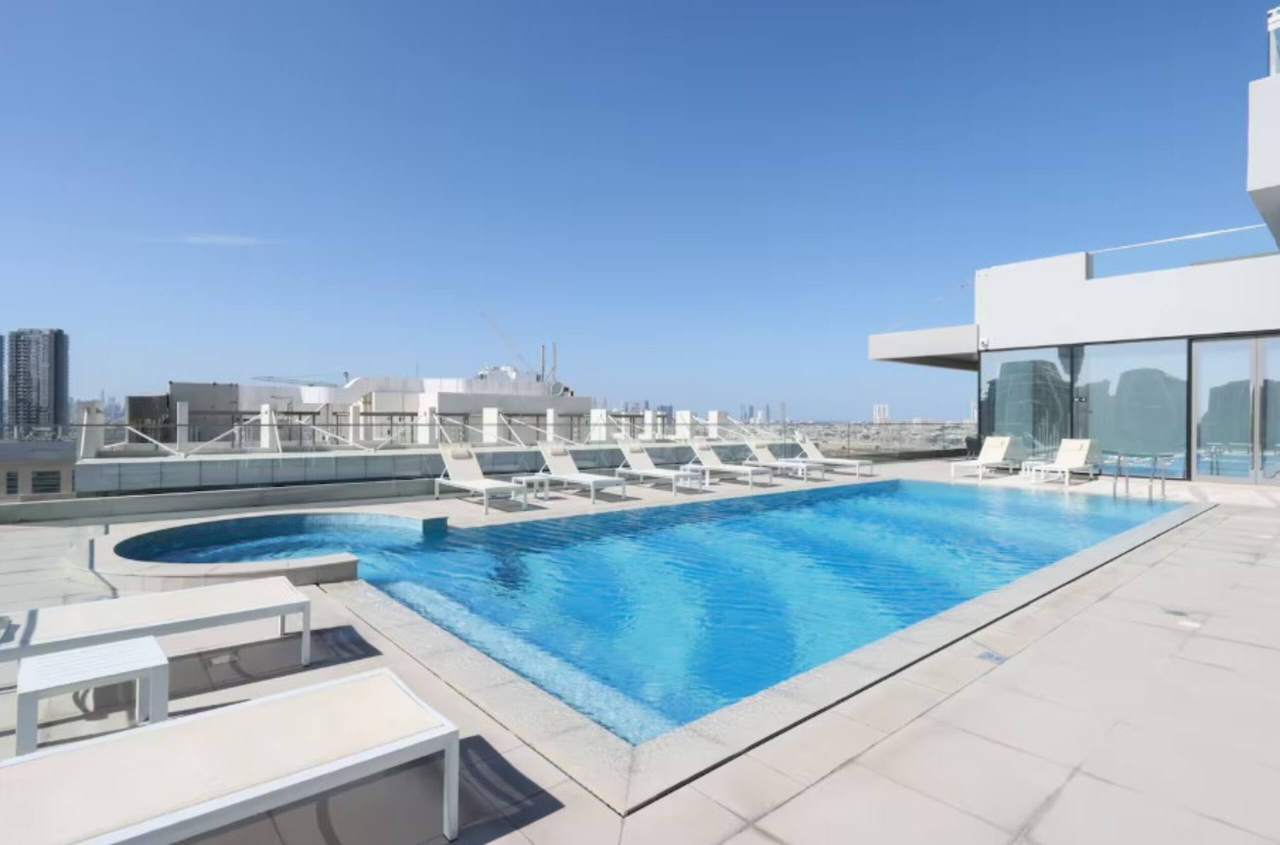 Modern 1BR Pool Gym JVC - Tap to explore photos