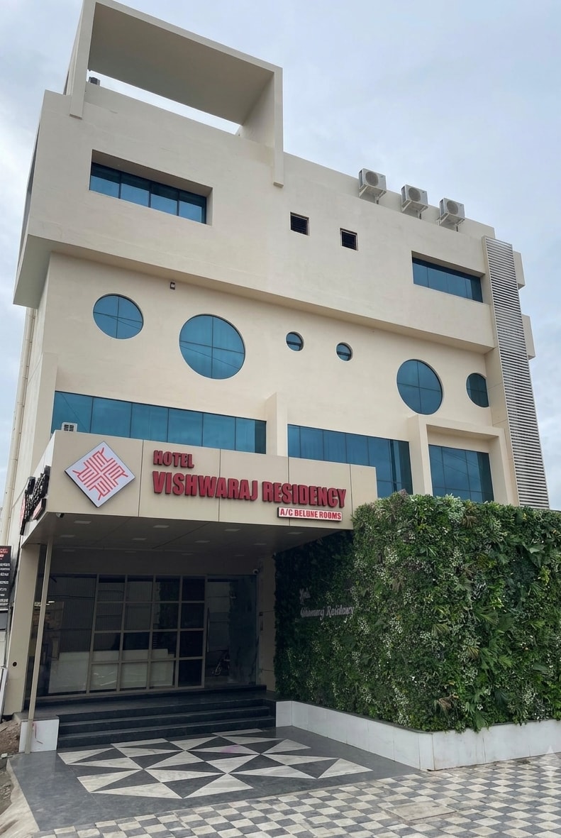 Hotel Vishwaraj Residency - Tap to explore photos
