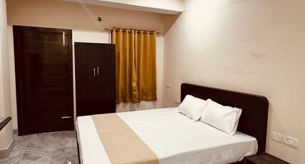 The Aura Grand Hotel & Cafe Room Type - Deluxe Room