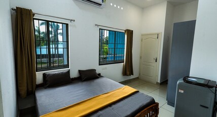Hishams Bhavan Room Type - Deluxe Double AC Room
