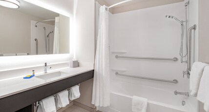 Holiday Inn Express & Suites Trinidad Room Type - 1 King Suite Communications Mobility Accessible Tub Holiday Inn Express & Suites Trinidad Room Type - 1 King Suite Communications Mobility Accessible Tub