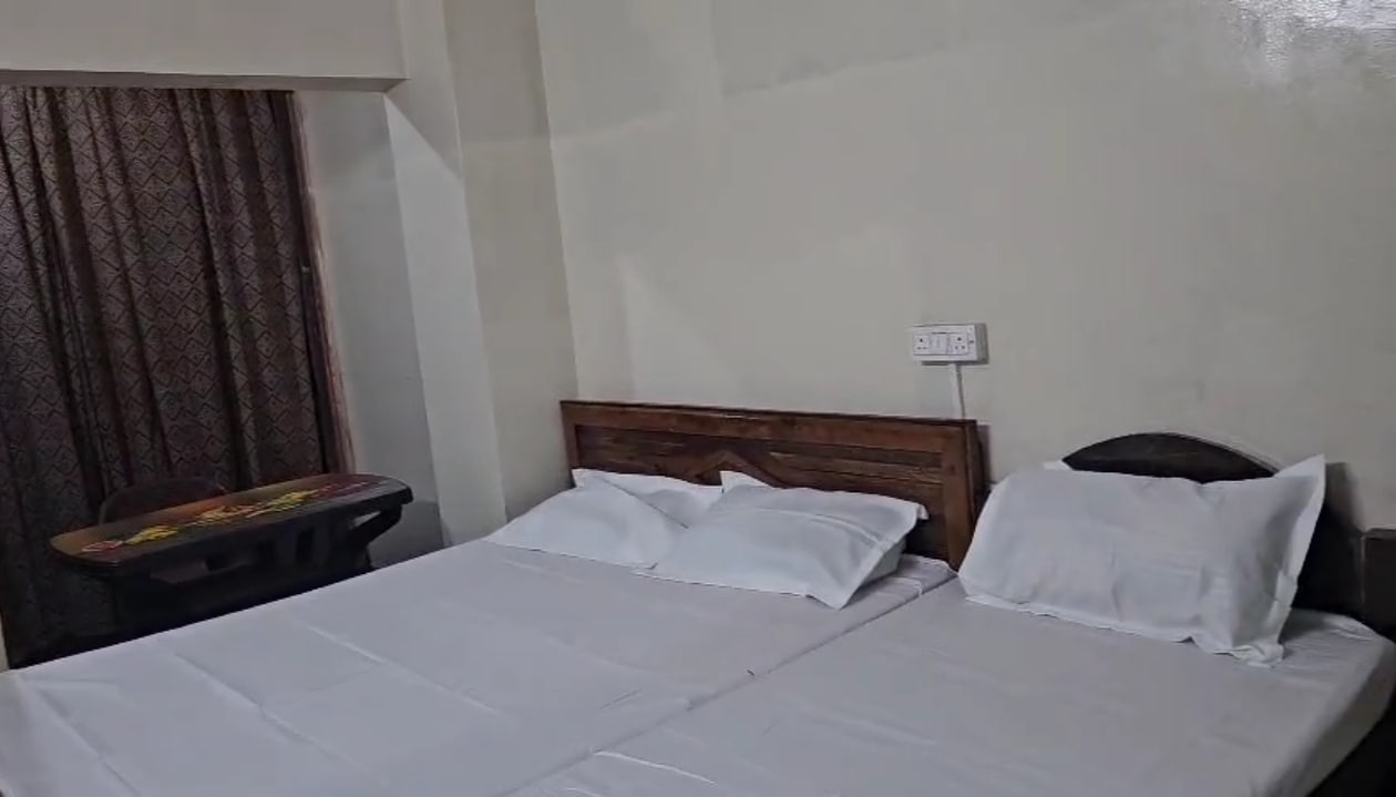 Yogeshwar guest house - Tap to explore photos