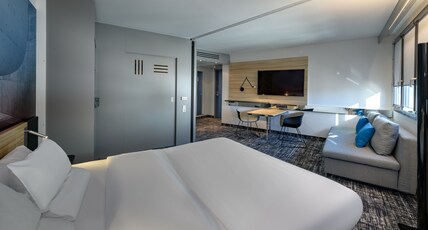 NOVOTEL SUITES BER POTSDAMER PL Room Type - Standard Suite: double bed, single sofa bed, kitchenette ideal for guests with limited NOVOTEL SUITES BER POTSDAMER PL Room Type - Standard Suite: double bed, single sofa bed, kitchenette ideal for guests with limited