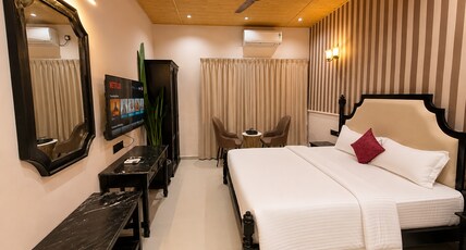 Guru Shikhar Heights - Highest Hotel in Mount Abu (5700 feet) Room Type - Premium Valley View Room