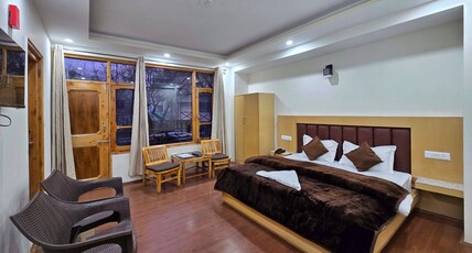 Solang Snow Heaven | Close to Solang Snow Point Room Type - Deluxe Room | Balcony and Mountain View