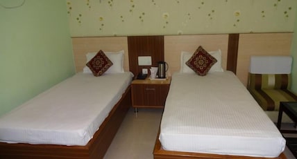 Hotel Om Regency Room Type - Deluxe Room