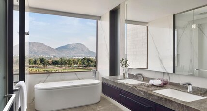 JW Marriott Bengaluru Prestige Golfshire Resort and Spa Room Type - Corner Suite, Executive lounge access, Suite, 1 King, Golf view, Balcony JW Marriott Bengaluru Prestige Golfshire Resort and Spa Room Type - Corner Suite, Executive lounge access, Suite, 1 King, Golf view, Balcony