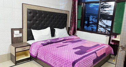Krishna Holiday Guest house block II. Room Type - Deluxe Room