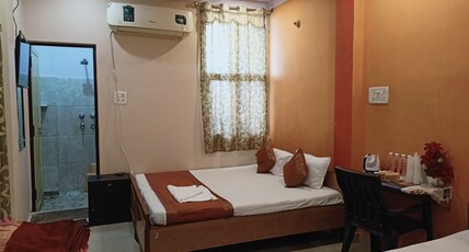  Hotel Aakash Ganga Room Type - Deluxe Family Room - AC