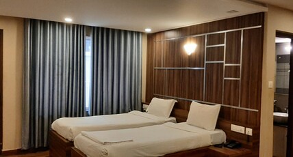 Hotel UC Plaza Room Type - Deluxe AC Room