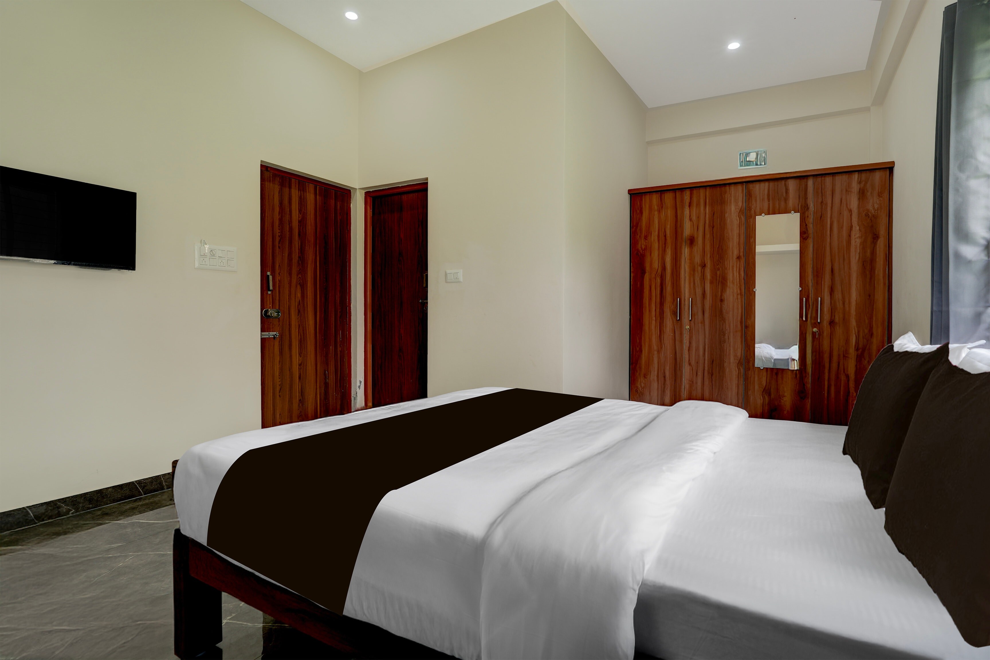 Hotel O Ambari Residency - Tap to explore photos