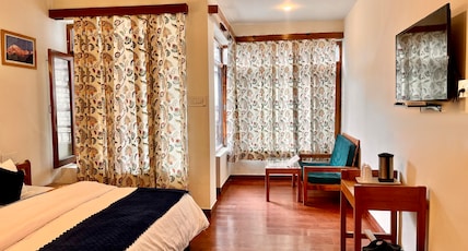 Tourist Hotel (10 Mins Walking from Mall), Manali Room Type - Deluxe Double Bedroom with Mountain view Balcony Tourist Hotel (10 Mins Walking from Mall), Manali Room Type - Deluxe Double Bedroom with Mountain view Balcony