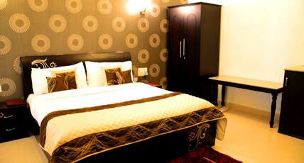 Hotel Luxmi Residency (Refinery Road) Room Type - Super Deluxe Room