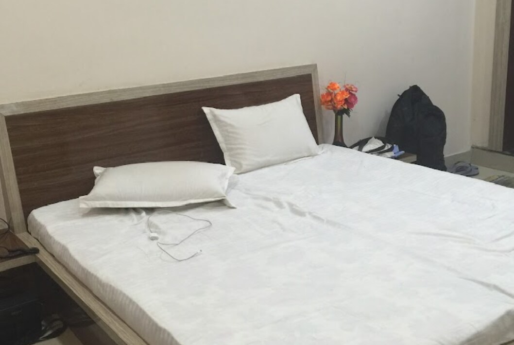 Hotel Mrityunjay by WB Inn - Tap to explore photos