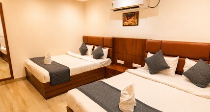 Nirmala Inn | Near Jain Ghat | Shivala Room Type - Quadruple Room