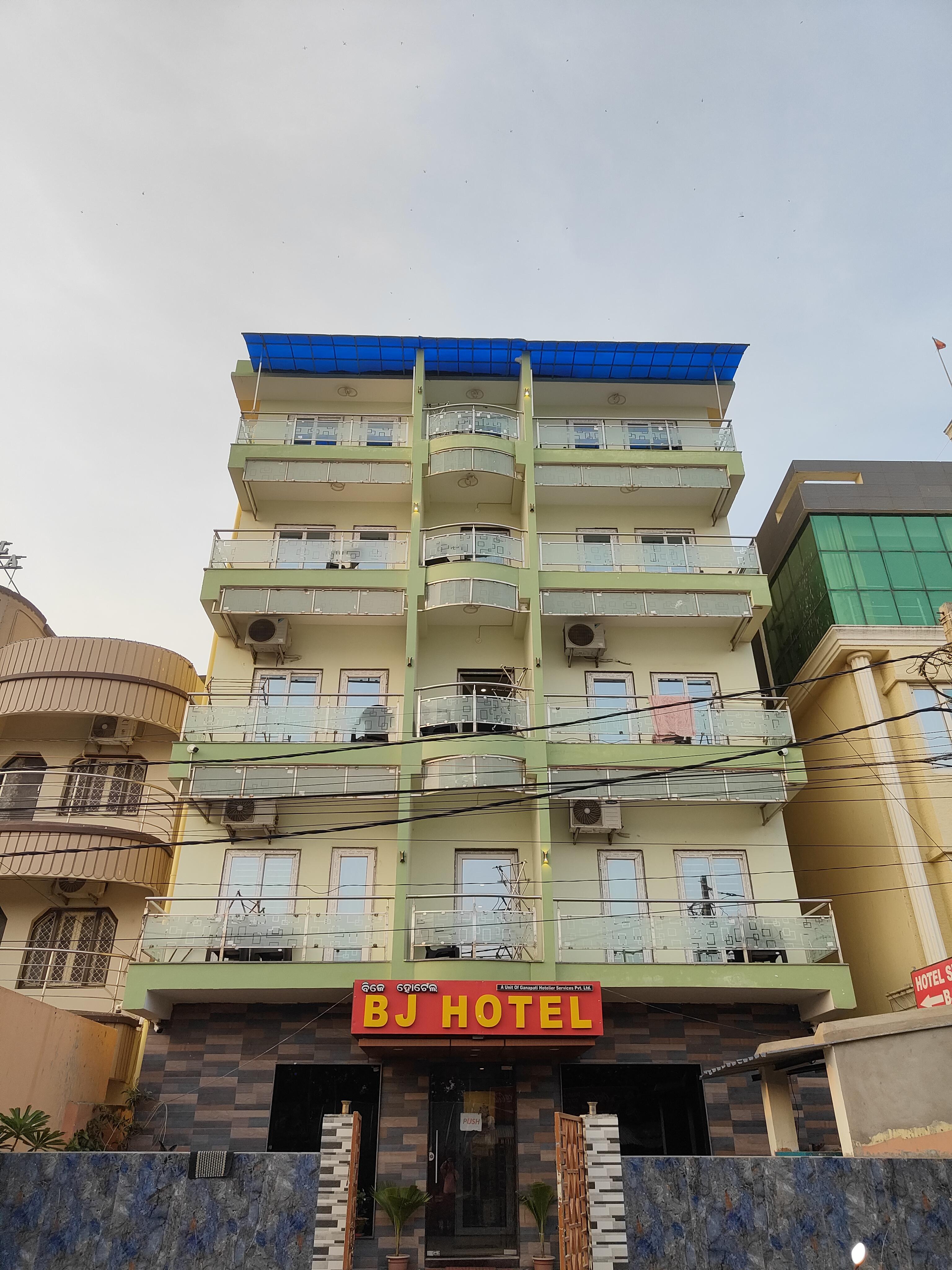B J Hotel - Tap to explore photos