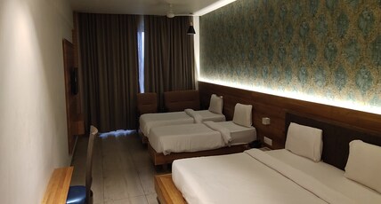 The Bliss Hotel - Pure Veg Room Type - 4 Bedded Deluxe Family AC Room
