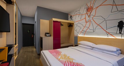 Ginger Noida Sector 133 Room Type - D-Luxe King Room