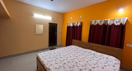 Shradharam Lodge Room Type - AC Deluxe Room