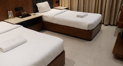 Ambika Family Restaurant Room Type - Twin Sharing Room