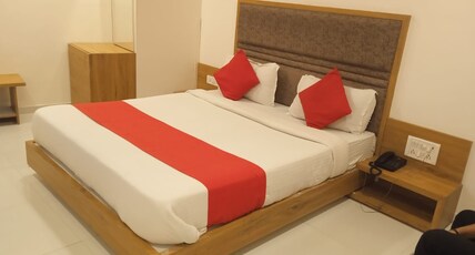 Hotel Maan Palace Chandkheda Room Type - Deluxe Rooms(NRI and Foreigner not allowed)