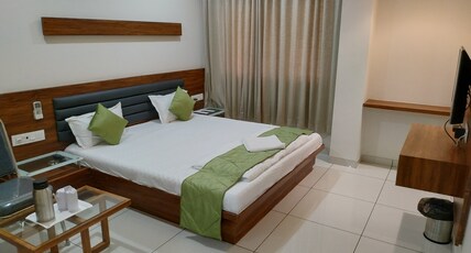 HOTEL SATKAR CHHATRAL Room Type - Deluxe AC Room