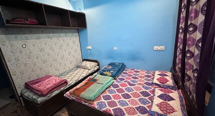 Chaukhamba Height Hotel Room Type - Family room for 3 to 4 Adults.