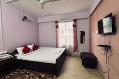 Rooms of Hotel O Kahilipara Guwahati Formerly Nirvis Grand