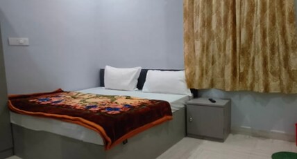 Shivashram Guest House Room Type - Double Bed AC Room