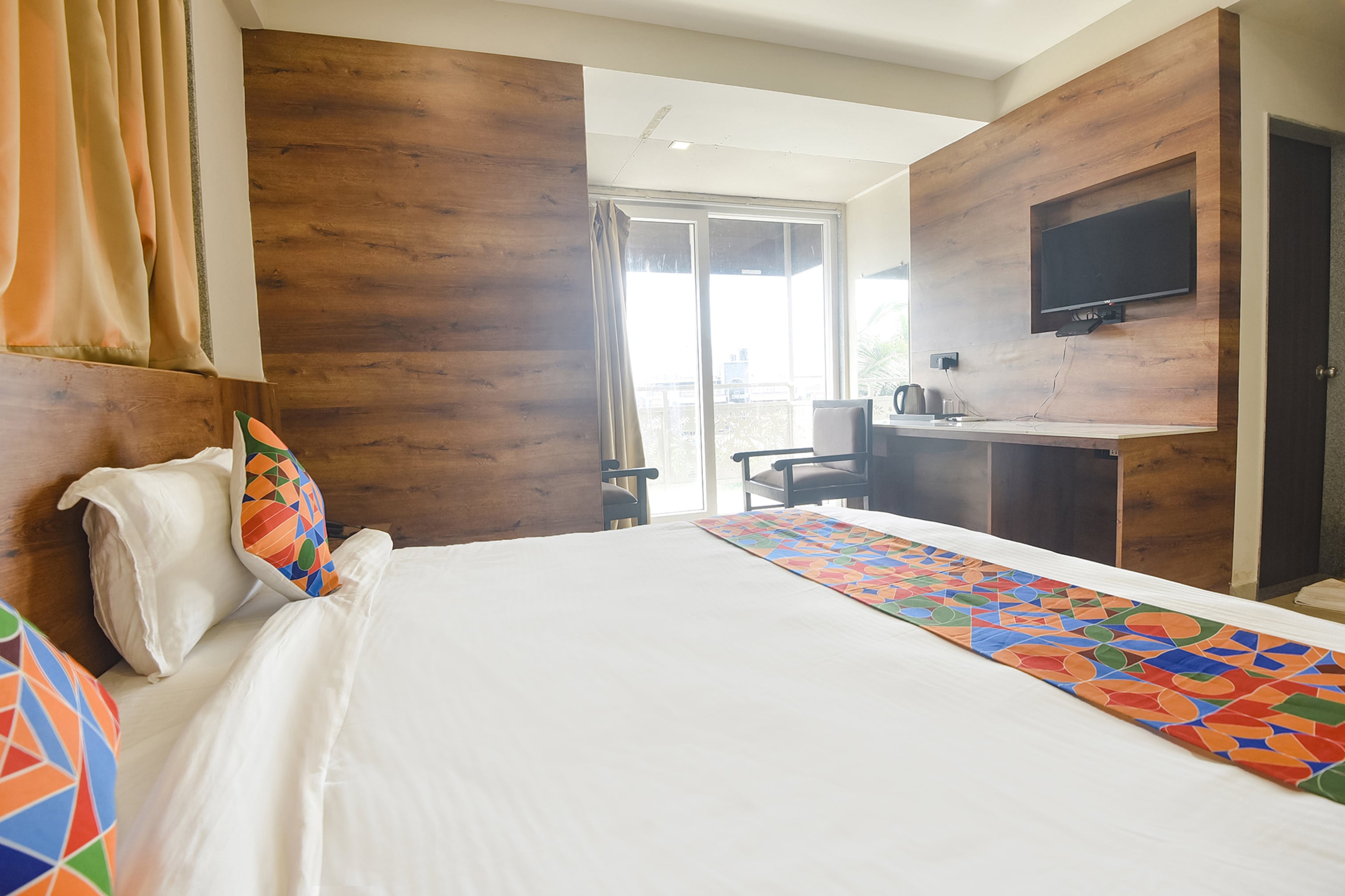 FabHotel Avasa Grand - Nr. Big Daddy Casino - Tap to explore photos