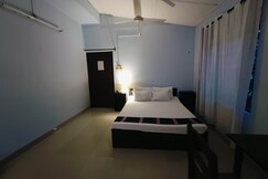 Krishna Kutir | Rooms with Kitchen Near GMCH & Nemcare (10-Min Walk)