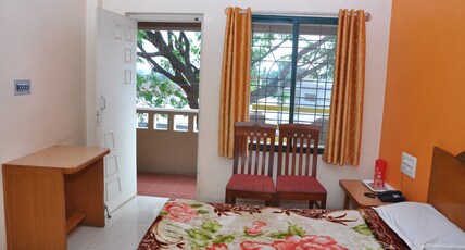 Vinayaka Lodge Room Type - Deluxe Double Room