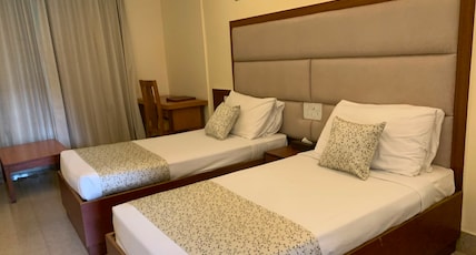 Indo Hokke Hotel Room Type - Standard Twin Room Indo Hokke Hotel Room Type - Standard Twin Room