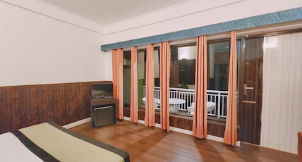 Blossom Resort Kasauli Room Type - Deluxe Room with Balcony (Valley View) Blossom Resort Kasauli Room Type - Deluxe Room with Balcony (Valley View)