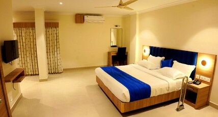 Hamilton Residency,Kuruppampady Room Type - DELUXE  A/C