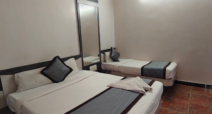 Kiara Eshosans Palace (100 meters From Sai Samadhi Temple) Room Type - Standard Triple Bed AC Room Kiara Eshosans Palace (100 meters From Sai Samadhi Temple) Room Type - Standard Triple Bed AC Room