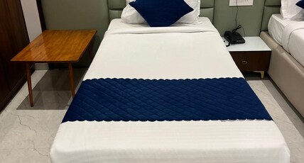 Sai Residency Room Type - Deluxe Triple Bed room