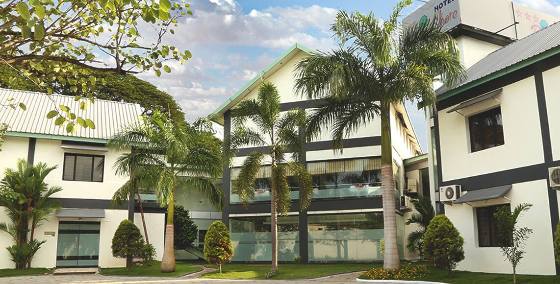 Hotel Palm Shore - Tap to explore photos