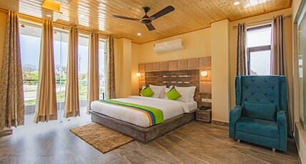 Treebo Ortus Residency Room Type - Spacious Premium Room with Mountain View