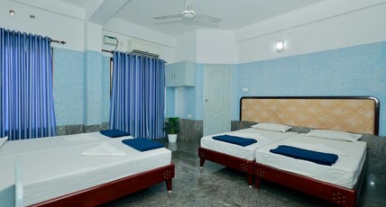 Sauhrudam Resort and Restaurant Room Type - Deluxe Quadruple AC Room
