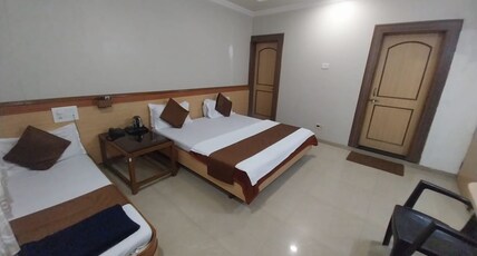 Hotel Om Park Room Type - Deluxe Triple Bed AC