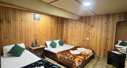 Phamlhakhang Eco Homestay Room Type - Tripple bedded room ( front lawn overlooking the Mountains) Phamlhakhang Eco Homestay Room Type - Tripple bedded room ( front lawn overlooking the Mountains)