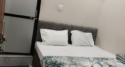 Maa Kripa guest house Room Type - Deluxe AC Room with Private Western Bathroom
