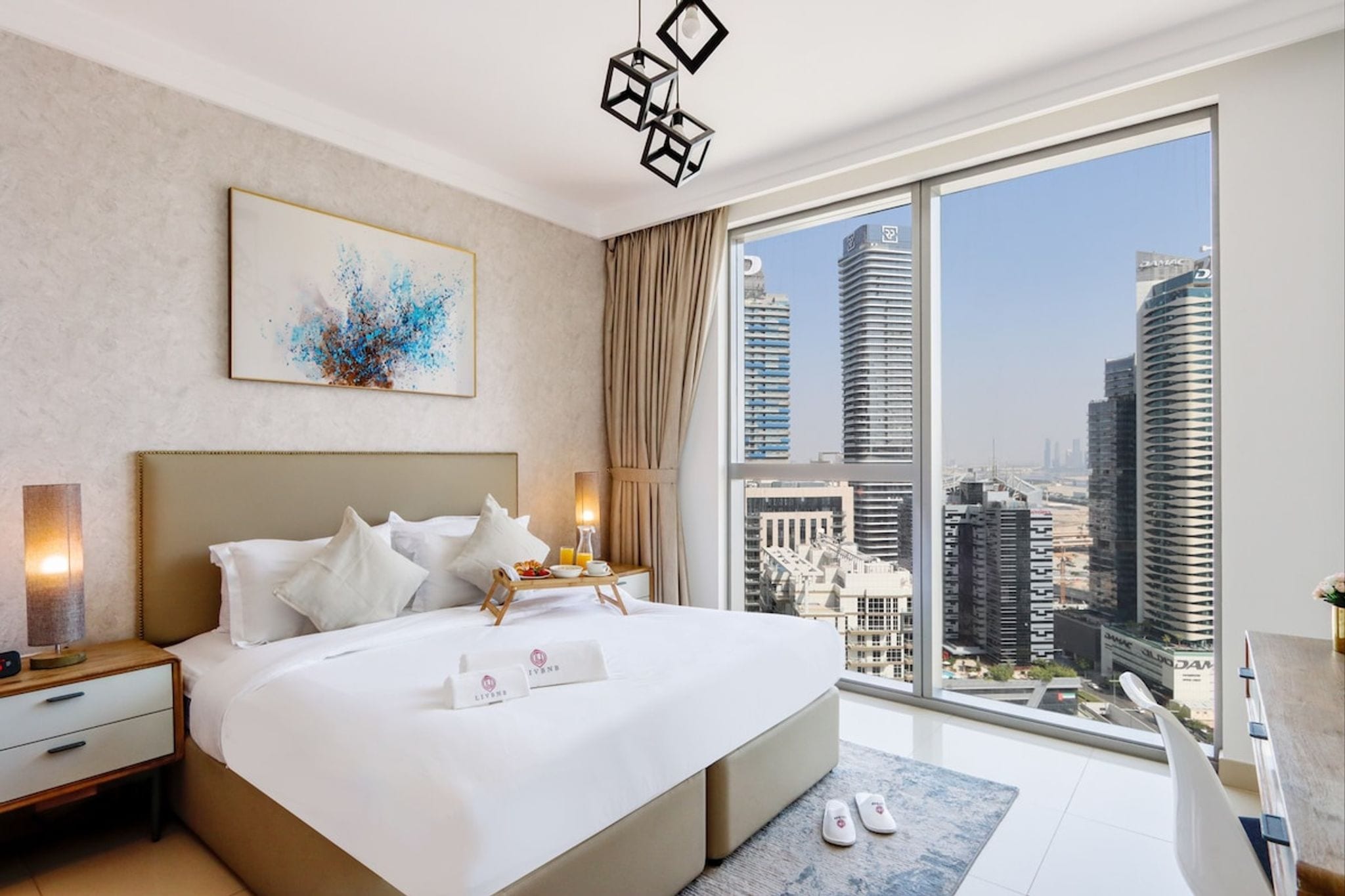 ELIVAAS Curated Bright 1BR, Boulevard Point - Tap to explore photos