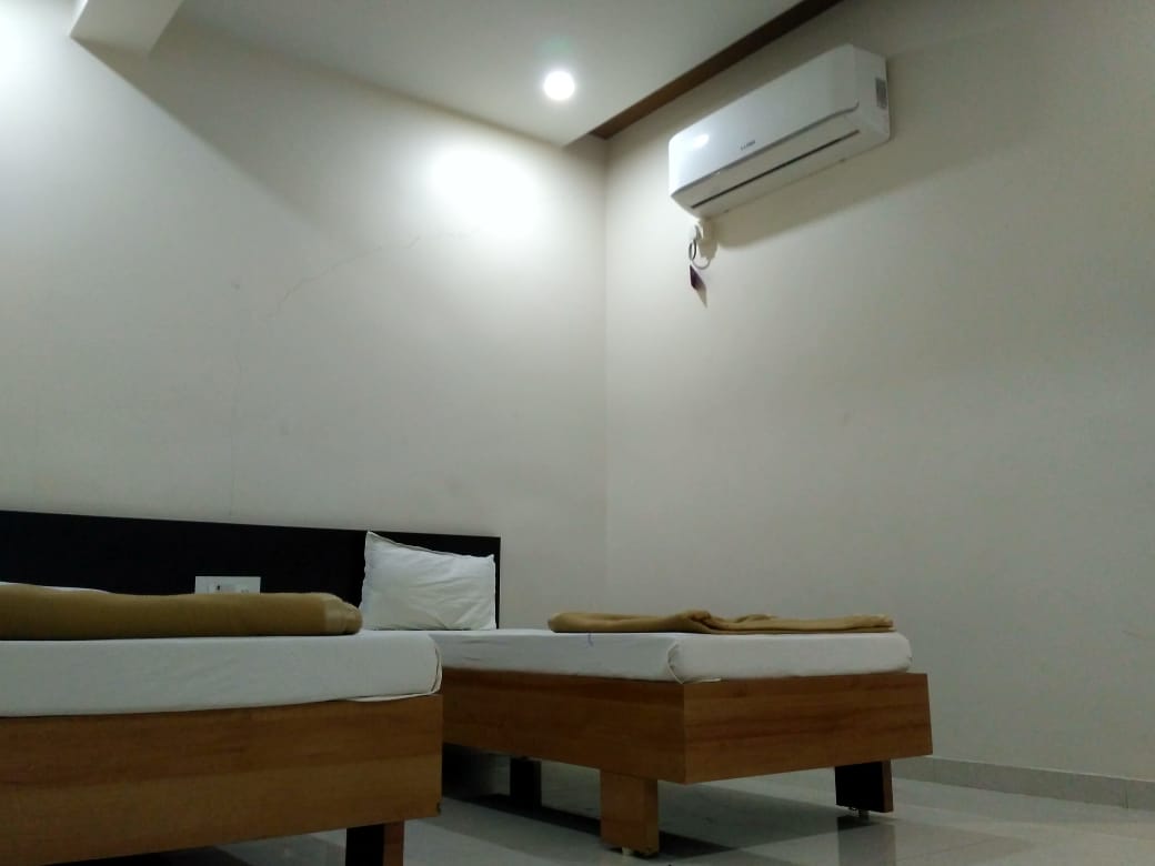 Hotel Anand - Tap to explore photos