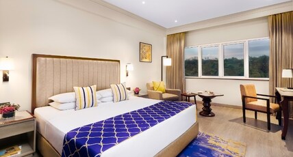 Vivanta Bengaluru, Residency Road Room Type - Deluxe Room Pool View King Bed