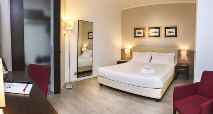 Best Western Plus Hotel Modena Resort Room Type - Suite-1 King Bed, Non-Smoking, Double Sofabed, Living Room, 2 32 Inch Led Tvs, Kitchenette, Patio Best Western Plus Hotel Modena Resort Room Type - Suite-1 King Bed, Non-Smoking, Double Sofabed, Living Room, 2 32 Inch Led Tvs, Kitchenette, Patio