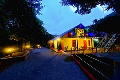 Pookode Holidays - by a small stream