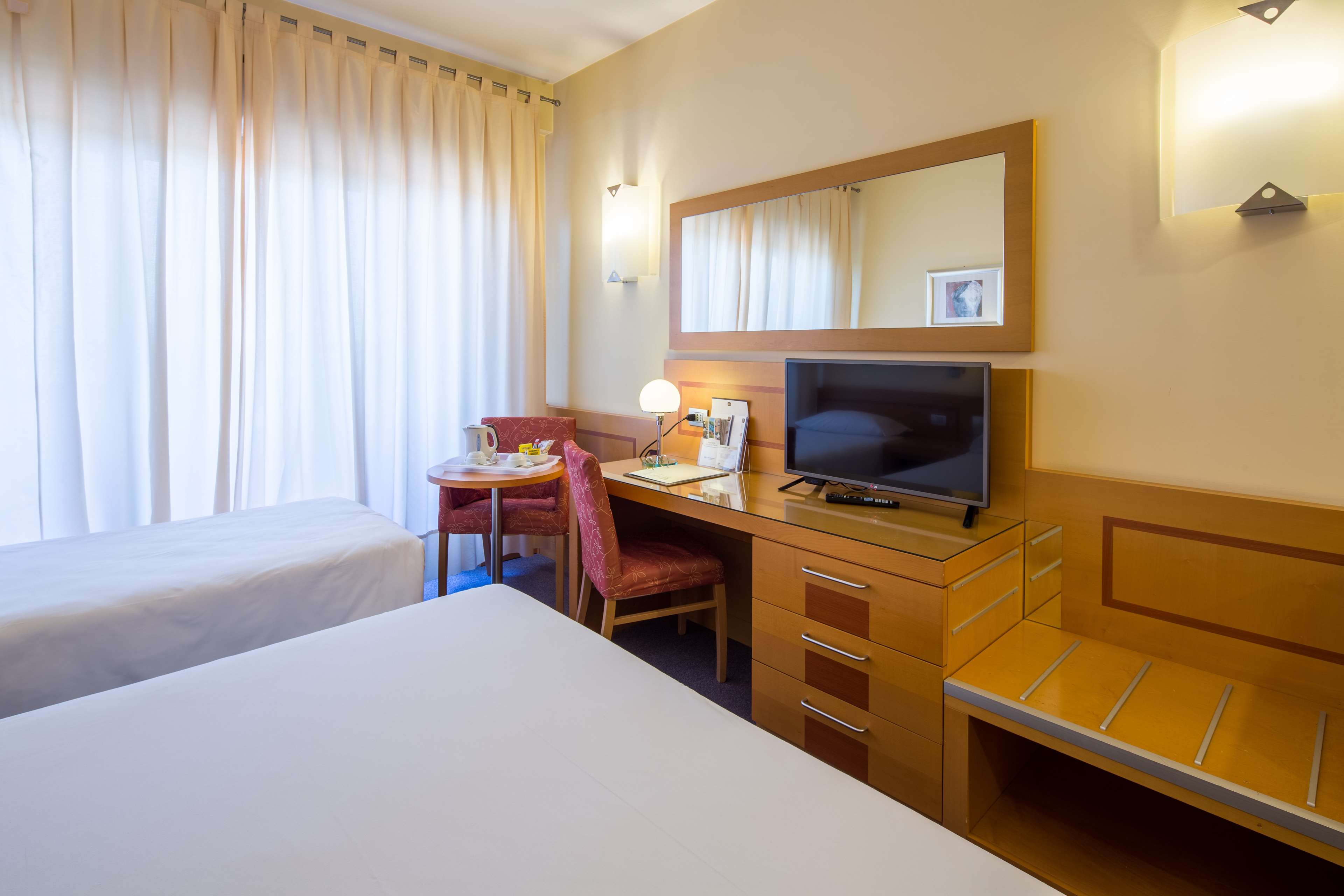 Best Western Hotel I Triangoli - Tap to explore photos