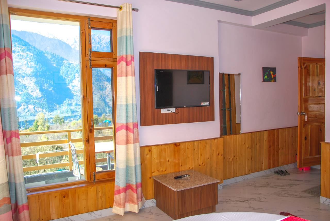 Cafe Saffron & Cottages Manali - Tap to explore photos